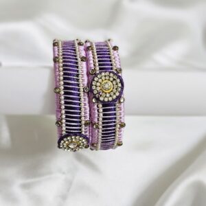 discover the elegance and tradition of our handcrafted bridal silkthread bangles, designed exclusively for your special occasions. each bangle is delicately wrapped in vibrant silk threads and embellished with beads, kundans, and sparkling stones—giving you a look that's as unique as your story. available sizes: 2.4, 2.6, 2.8, 2.10, 2.12 color customization: side bangles are available in any color of your choice. customization & dispatch: minimum 7 to 10 days needed for dispatch. return policy: no returns on customized bangles (each piece is individually crafted). celebrate your style with personalized silk thread bangles—each set is woven in your chosen colors and adorned with premium stones and motifs. whether they match your wedding theme or express your personality, our bangles let you shine on your big day. custom orders are lovingly crafted and dispatched within a week to ten days; please note that customized pieces are not eligible for return.silk thread bangles